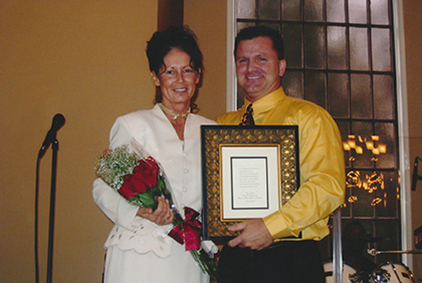 Vickie and Terry accepting Minister of Music Award Image